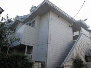 an apartment building in a quiet residential neighborhood of Omori